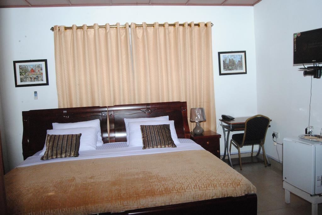 Okumah Hotel Kumasi Quarto foto