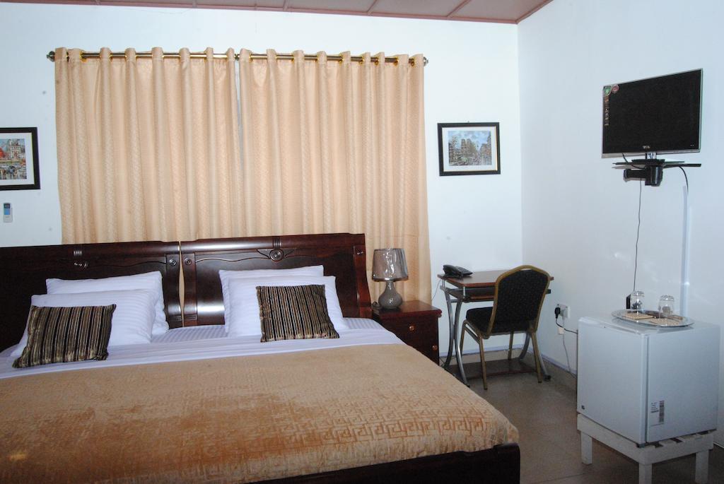 Okumah Hotel Kumasi Quarto foto