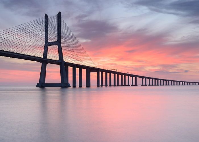Vasco da Gama Bridge Vasco da Gama Bridge over Tagus River in Lisbon at sunrise ... photo