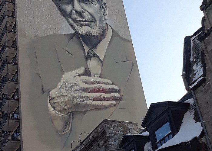 Leonard Cohen Mural Mural of Leonard Cohen on the side of an apartment building in ... photo
