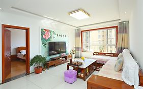 青岛金沙滩全家幸福三居室海景公寓blessed Family Apartment Qingdao Exterior photo